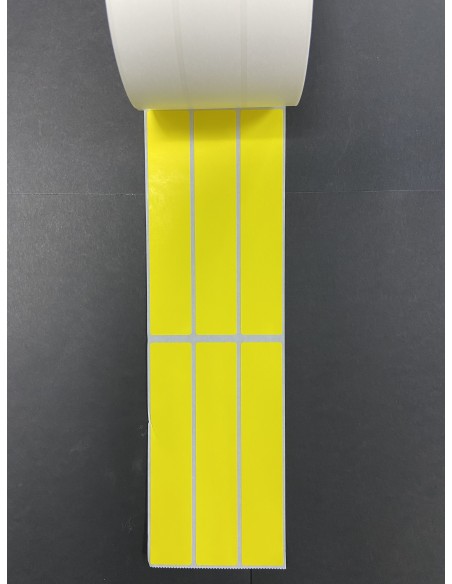 ROLLO  1 MILLAR DE ETIQUETAS  PAPEL FONDO AMARILLO  POLIPROPILENO BLCO. BRILLO 30 x 160