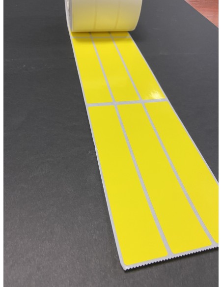 ROLLO  1 MILLAR DE ETIQUETAS  PAPEL FONDO AMARILLO  POLIPROPILENO BLCO. BRILLO 30 x 160