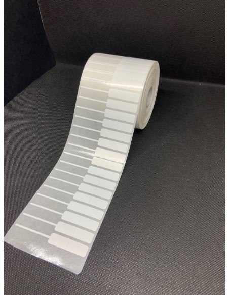 Etiquetas adhesivas para JOYERIA, rollo 4.000 etiq. - 80  x  10 mm con RESERVA DE ADHESIVO